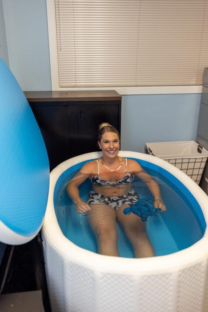 Woman relaxing in an indoor ice bath tub